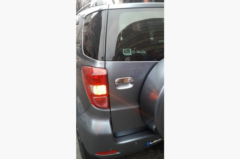 Daihatsu Terios 2006-2017 рр. Накладка на ручку відкривання багажника (нерж.) Фото 2