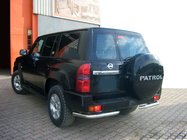 Nissan Patrol Y61 1997-2011 рр. Задні кути AK003 (2 шт, нерж.) фото 1