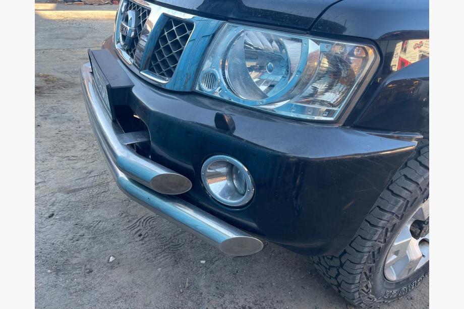Nissan Patrol Y61 1997-2011 рр. Передній бампер у зборі б.у. (2004-2008) Image