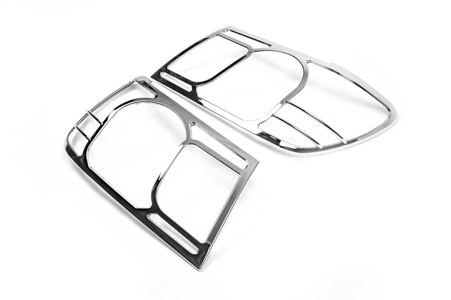 Toyota Land Cruiser 100 1998-2007 рр. Накладки на фари V1 (2 шт., пласт.) Image