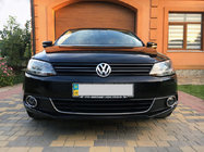 Volkswagen Jetta 2011-2018 рр. Накладка на противотуманки (2 шт., нерж) фото 1