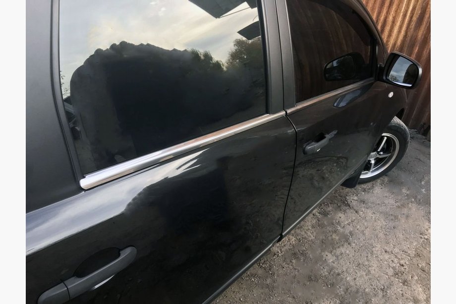 Nissan Note 2004-2012 рр. Окантовка вікон (4 шт, нерж) Image