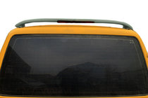 Volkswagen T4 Caravelle/Multivan 1990-2003 рр. Спойлер на дах з стоп-сигналом ісіклі (під фарбування) фото 1