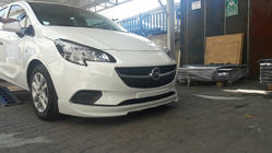 Opel Corsa E 2015-2019 рр. Передня нижня накладка (під фарбування) фото 1