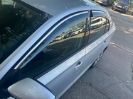 Skoda Rapid 2012-2019 рр. Вітровики з хромованим молдингом Niken Luxury (4 шт) фото 1