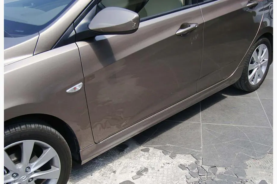 Hyundai Accent 2011-2017 рр. Бокові пороги DPT (під фарбування)