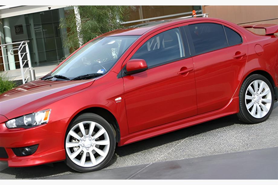 Mitsubishi Lancer X 2008- рр. Бокові пороги DPT (Під фарбування) Image