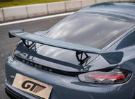 Porsche Boxster/Cayman 982 (718) 2016- рр. Спойлер карбоновий GT4 фото 1