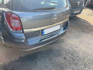 Opel Astra H 2004-2013 рр. Накладка на задній бампер OmsaLine глянець (SW, нерж) фото 2