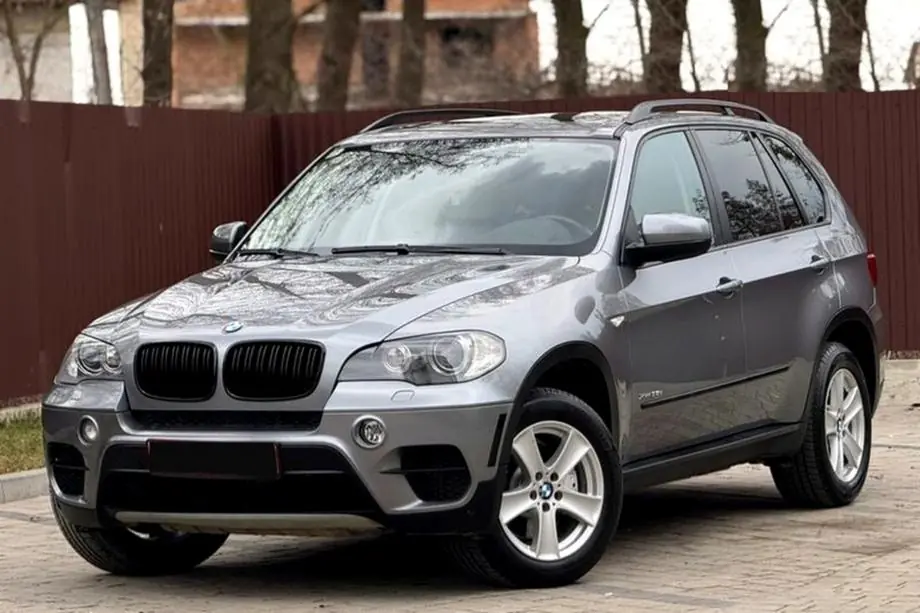 BMW X5 E70 2007-2013 рр. Накладки на арки OEM (листва) Передня ліва (1 шт) Фото 1