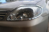 Toyota Corolla 2002-2007 рр. Накладки на фари V1 (2002-2004, 2 шт., пласт) фото 1