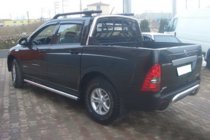 SsangYong Action 2005-2018 рр. Бічні труби (2 шт., нерж) фото 2
