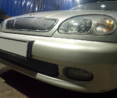 Daewoo Lanos 1998-2017 рр. Зимова накладка на решітку (верхня) фото 4