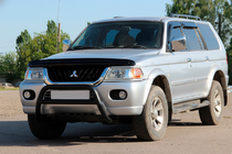 Mitsubishi Pajero Sport 1996-2007 рр. Кенгурятник WT022 Black (нерж) фото 3