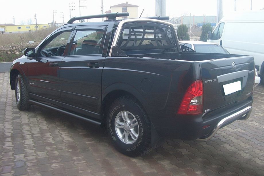 SsangYong Action 2005-2018 рр. Бічні труби Black (2 шт., нерж) Фото 2