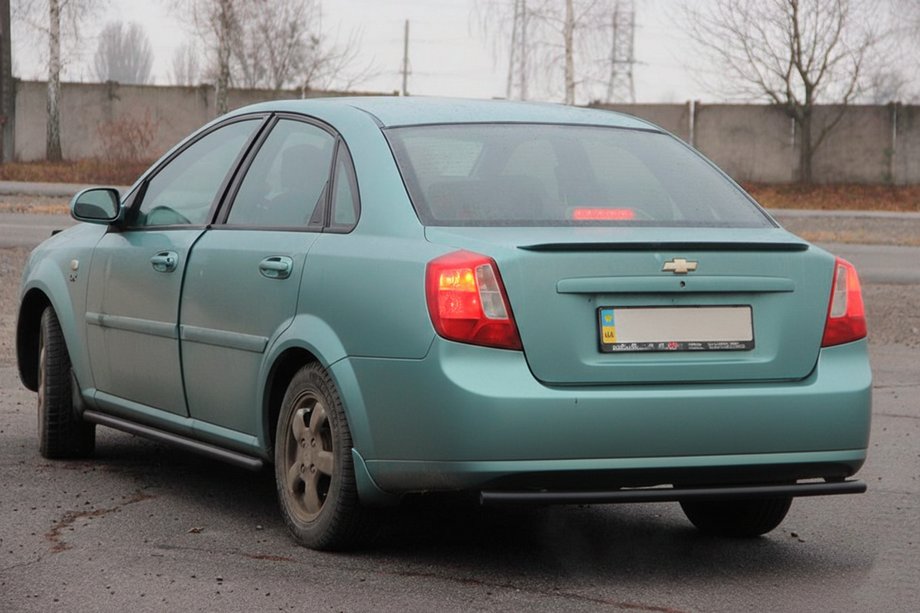 Chevrolet Lacetti 2003-2024 рр. Задній захист AK002 Black (42мм, нерж.) Фото 4