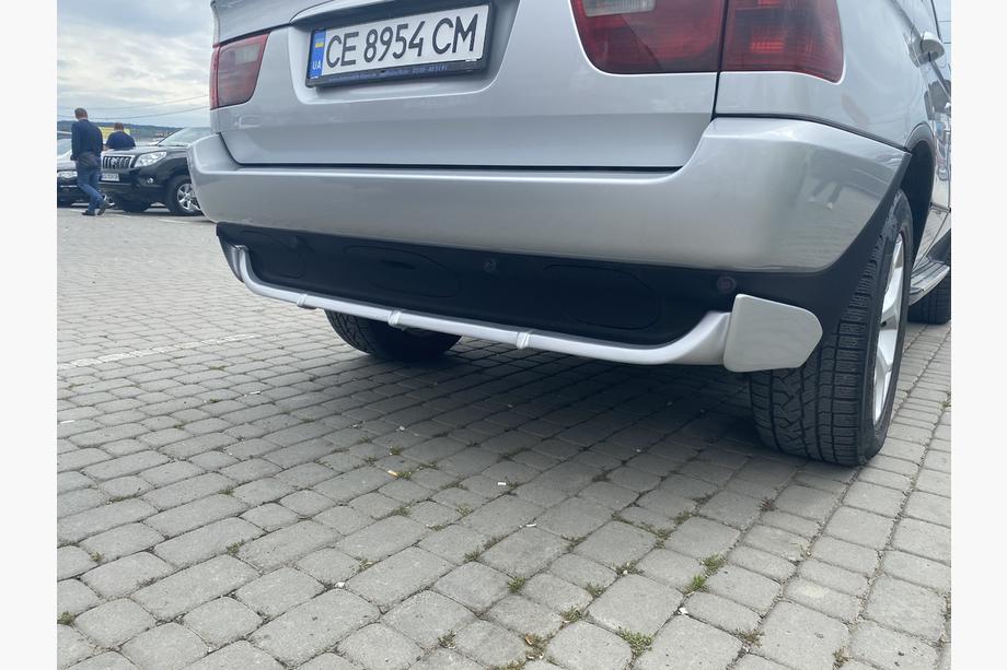 BMW X5 E53 1999-2006 рр. Накладка на задній бампер (під фарбування) Image