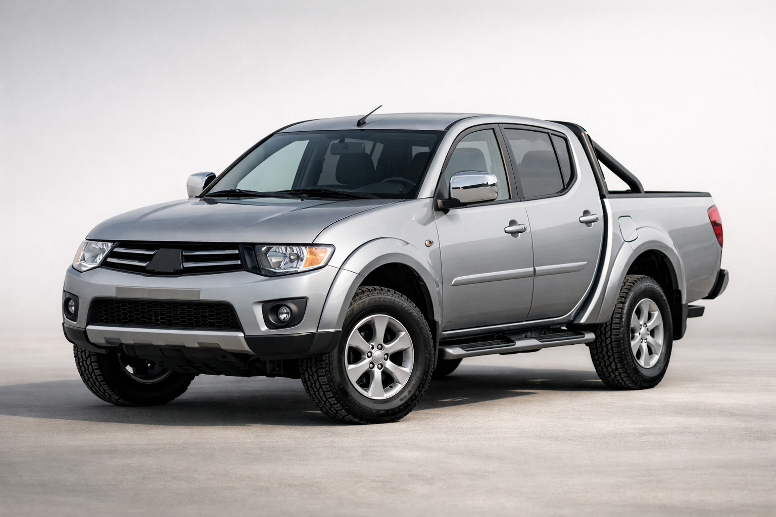 Огляд Mitsubishi L200 2006-2015: чи досі це сильний робочий пікап
