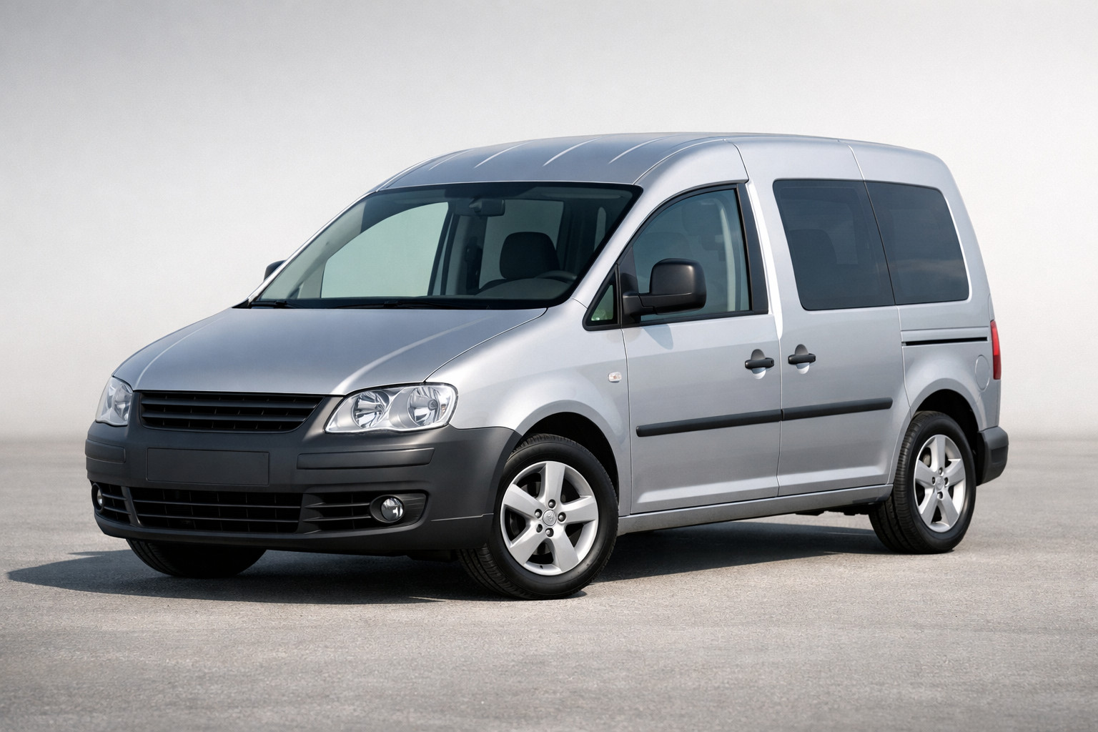 Огляд Volkswagen Caddy 2004-2010: маленький комерційний герой