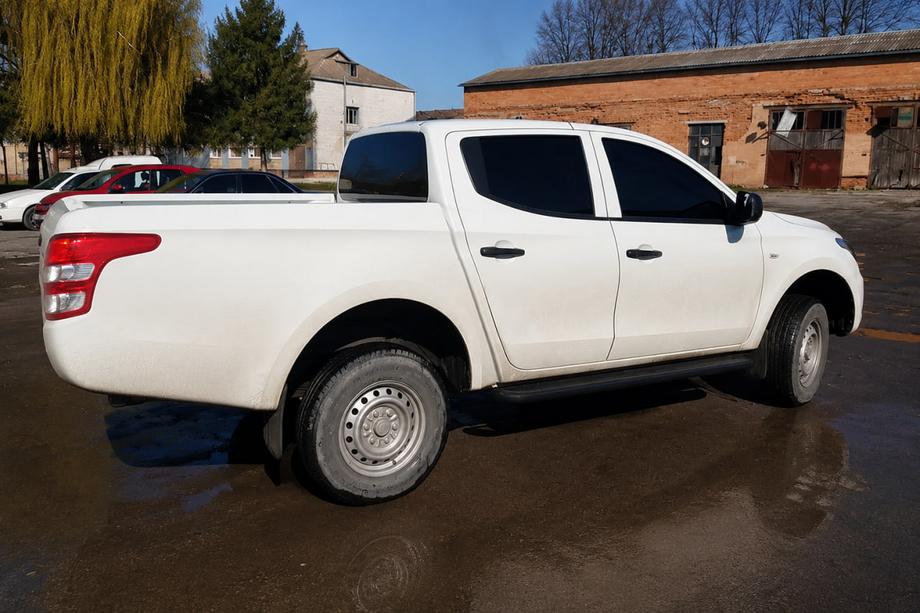 Fiat Fullback 2016- рр. Бокові пороги Premium (2 шт., нерж.) Black Ø60 Фото 1