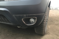Dacia Duster 2008-2018 рр. Накладки на противотуманки 2010-2013 (2 шт., нерж) фото 1