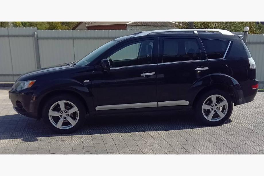 Mitsubishi Outlander 2006-2012 рр. Окантовка вікон (8 шт, нерж) Image