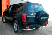 Nissan Patrol Y61 1997-2011 рр. Задні кути AK003 (2 шт, нерж.) фото 1