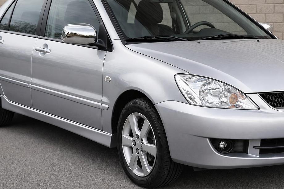 Mitsubishi Lancer 9 2004-2008 рр. Накладки на дзеркала (2 шт) Image