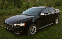 Mitsubishi Lancer X 2008- рр. Накладки на дзеркала (2 шт) фото 1