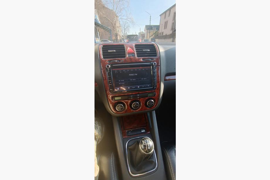 Volkswagen Jetta 2006-2011 рр. Накладки на панель Карбон Фото 4