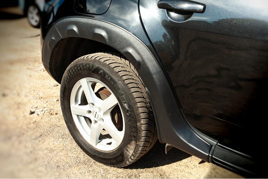 Dacia Duster 2008-2018 рр. Накладки на арки з виступами (8 шт, пластикові) DDU - Україна Image