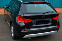 BMW X1 E84 2009-2015 рр. Накладка на задній бампер OmsaLine (нерж) фото 2