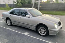 Mercedes E-сlass W210 1995-2002 рр. Накладки на арки (4 шт, чорні) фото 1