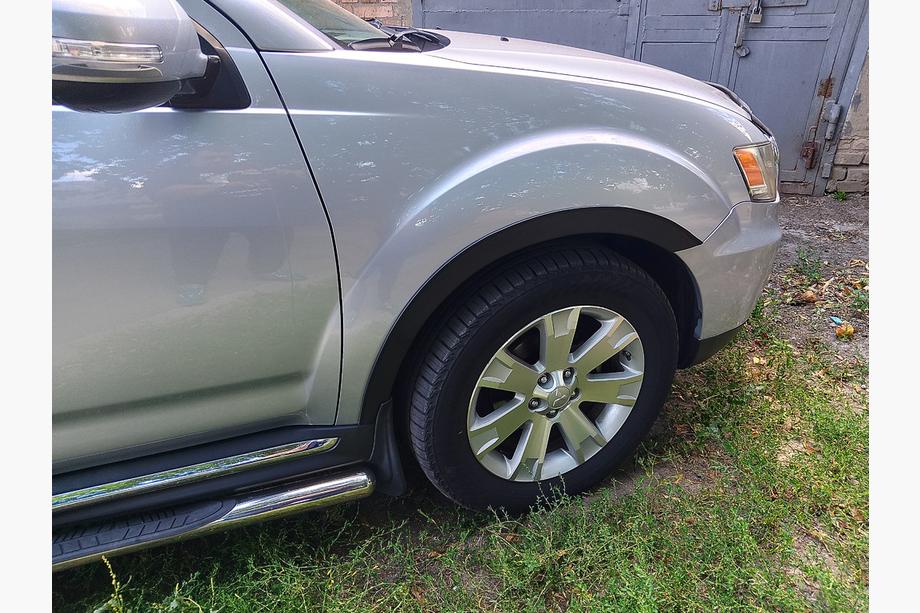 Mitsubishi Outlander 2006-2012 рр. Накладки на арки (4 шт, чорні) Image