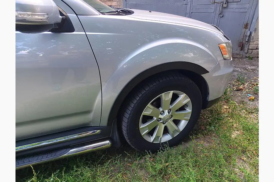 Mitsubishi Outlander 2006-2012 рр. Накладки на арки (4 шт, чорні)