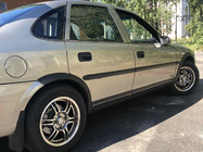 Opel Vectra B 1995-2002 рр. Накладки на арки (4 шт, чорні) фото 1