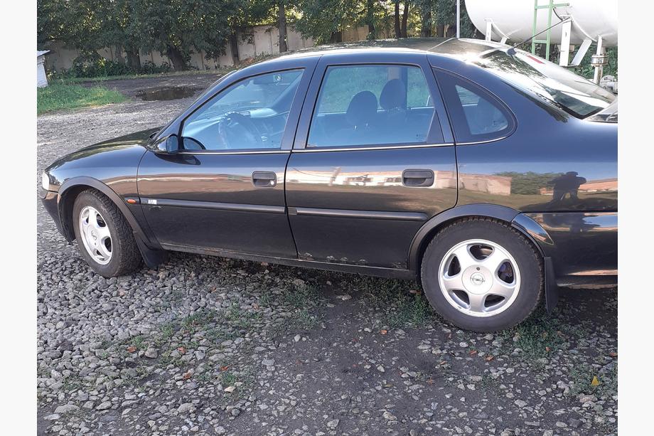 Opel Vectra B 1995-2002 рр. Накладки на арки (4 шт, чорні) Фото 6