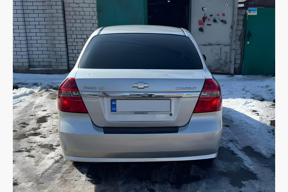 Chevrolet Aveo T250 2005-2011 рр. Накладка на задній бампер з загином Пластик Image