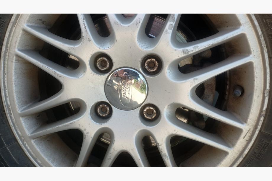 Ford Ковпачки на диски 68.5/50мм хром (4шт) Image