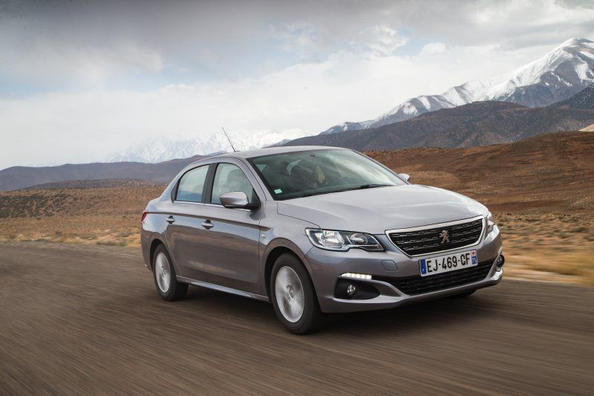 Огляд оновленого седана Peugeot 301 Фото 1
