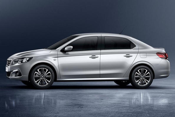 Огляд оновленого седана Peugeot 301 Фото 7