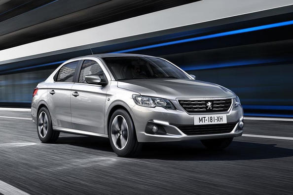 Огляд оновленого седана Peugeot 301 Фото 6