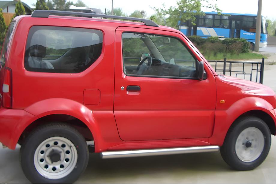 Suzuki Jimny 1998-2018 рр. Бічні труби (2 шт., нерж) Фото 1