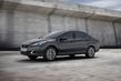 Огляд компактного седана Peugeot 408 фото 8
