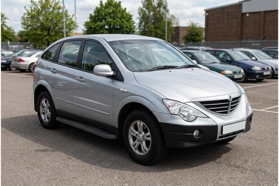 SsangYong Action 2005-2018 рр. Бокові пороги Tayga Black (2 шт., алюміній) Image