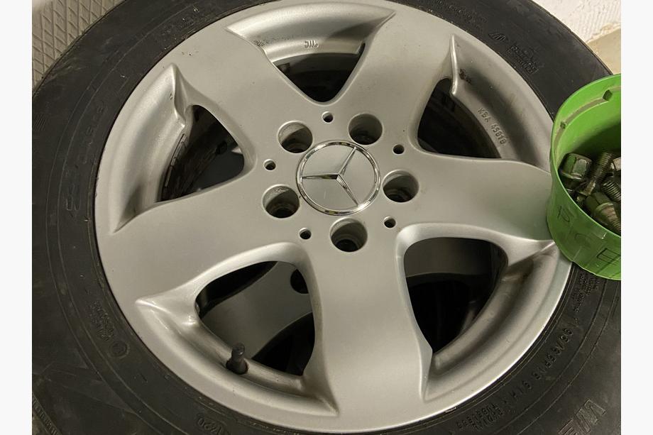 Mercedes-Benz Ковпачки на диски 75/71 мм без кільця (4 шт, сірі) Фото 2