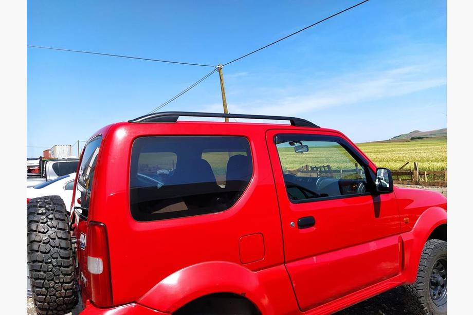 Suzuki Jimny 1998-2018 рр. Рейлінги Skyport (чорні) Image