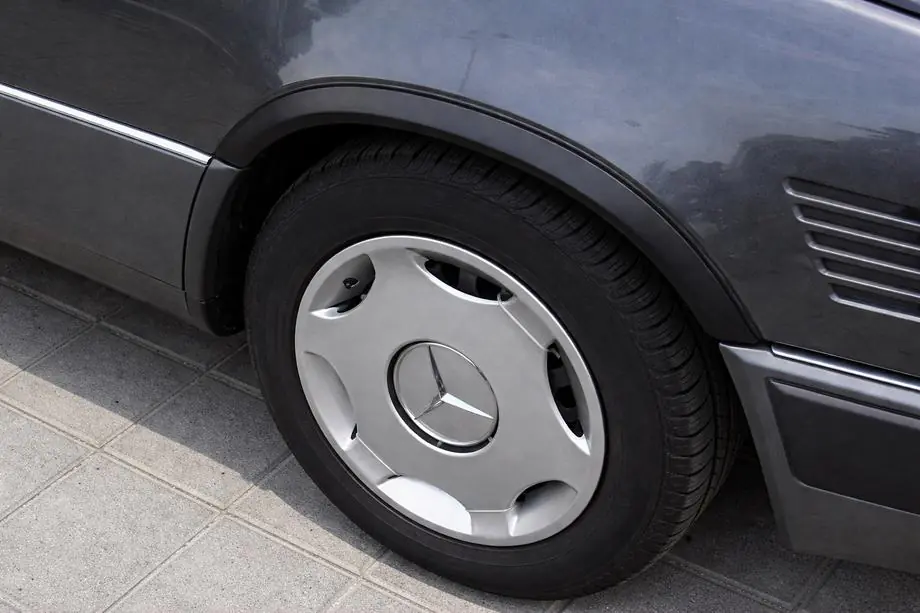 Mercedes E-class W124 1984-1997 рр. Накладки на арки 1989-1995 (4 шт, чорні, ABS-пластик)
