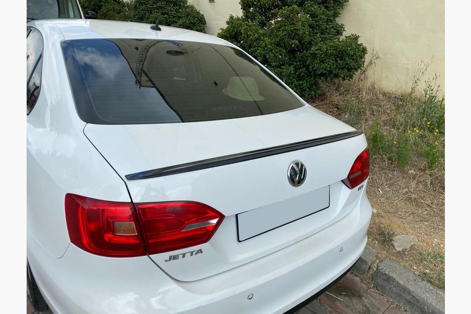 Volkswagen Jetta 2011-2018 рр. Спойлер LIP (Sunplex, чорний) (115,8см * 6,3см) Image