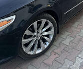 Volkswagen Passat СС 2008-2017 рр. Накладки на арки 2008-2012 (4 шт, чорні, ABS-пластик) фото 1